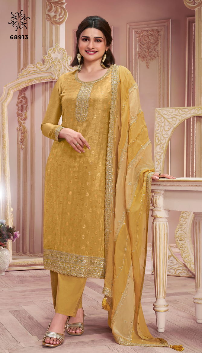 Shristi Light By Vinay Kuleesh Embroidered Dola Jacquard Salwar Kameez Suppliers In India
